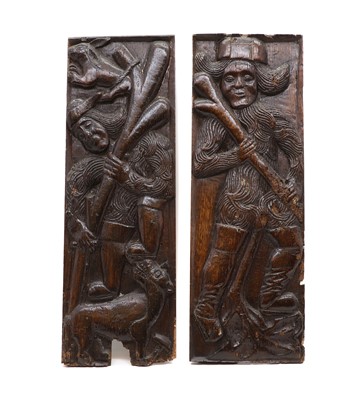 Lot 516 - A pair of carved oak Romayne panels