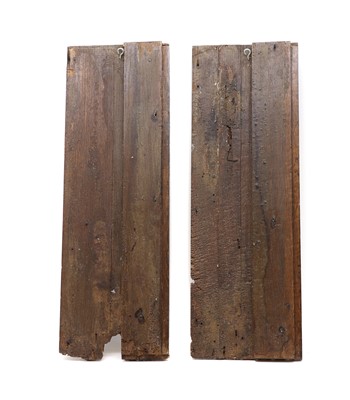 Lot 516 - A pair of carved oak Romayne panels