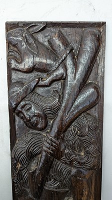 Lot 516 - A pair of carved oak Romayne panels