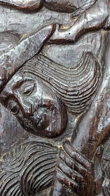 Lot 516 - A pair of carved oak Romayne panels