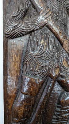 Lot 516 - A pair of carved oak Romayne panels