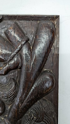 Lot 516 - A pair of carved oak Romayne panels