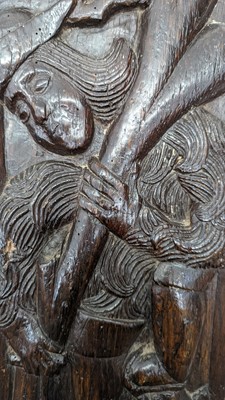 Lot 516 - A pair of carved oak Romayne panels