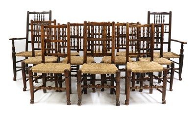 Lot 444 - A Harlequin set of twelve Lancashire ash spindle back dining chairs