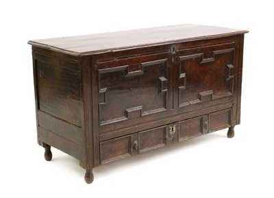 Lot 458 - A Jacobean oak mule chest