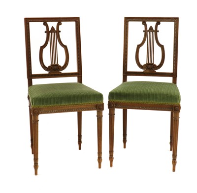 Lot 446 - A pair of Edwardian mahogany salon chairs