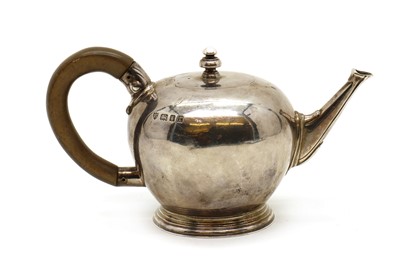 Lot 15 - A small silver Queen Anne-style teapot