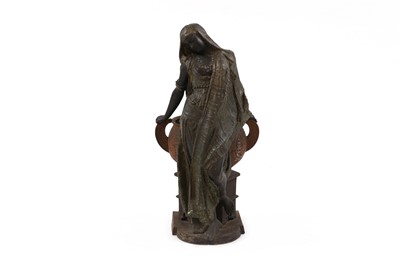 Lot 572 - A cast iron and metal jardinière stand