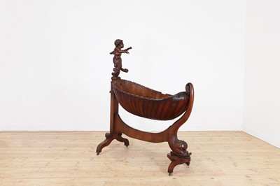 Lot 163 - A rococo carved walnut cradle