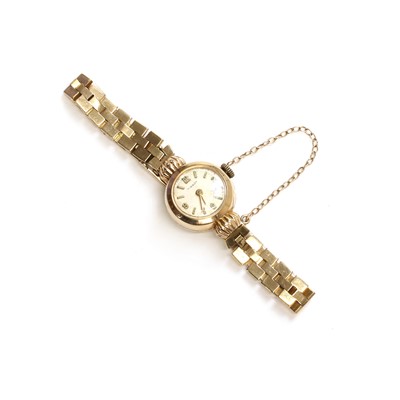 Lot 211 - A ladies' 9ct gold Tissot mechanical bracelet watch