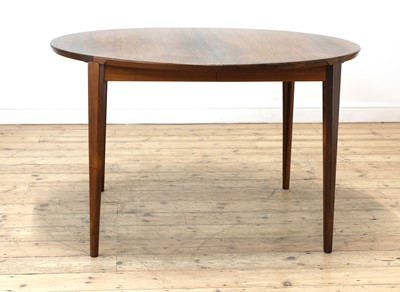Lot 395 - A Danish rosewood circular extending dining table