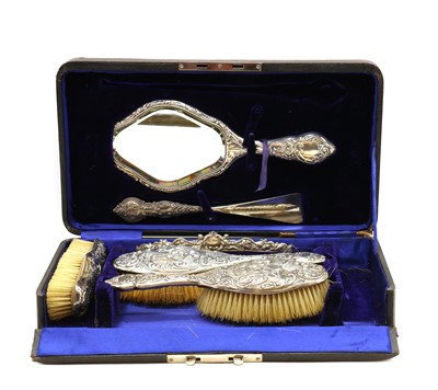 Lot 74 - A cased Victorian silver dressing table set