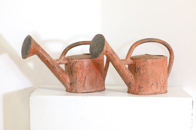 Lot 528 - A pair of toleware watering cans