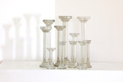 Lot 557 - A collection of eleven glass cake stands