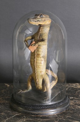 Lot 60 - An anthropomorphic taxidermy of a juvenile crocodile