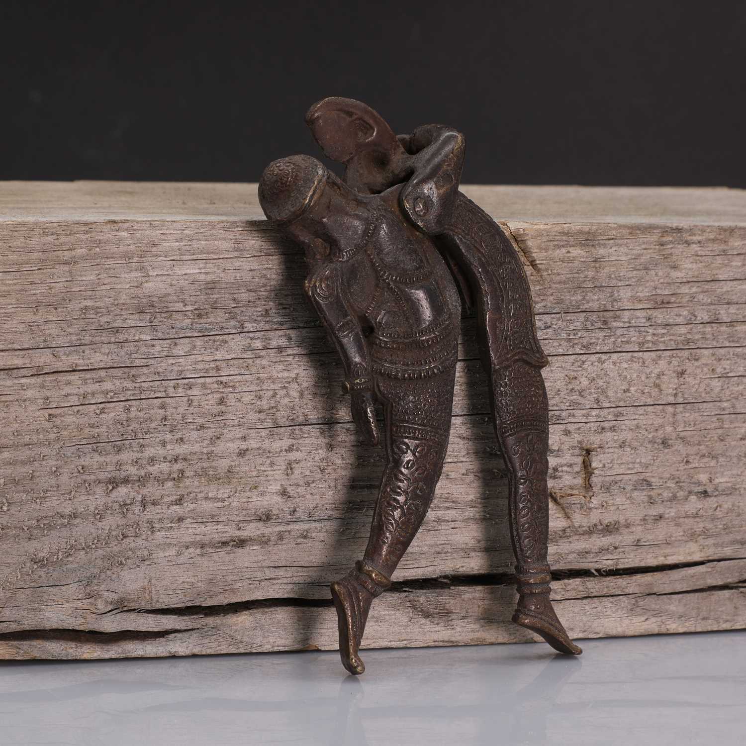 Lot 207 An Indian bronze betel nut cracker,