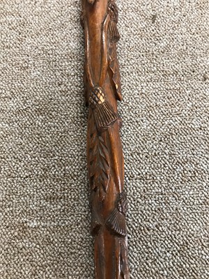 Lot 18 - A regimental folk art fruitwood cane