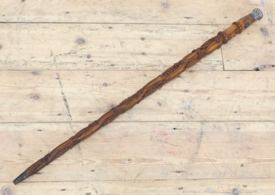 Lot 18 - A regimental folk art fruitwood cane
