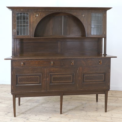 Lot 49 - An Arts and Crafts inlaid oak sideboard