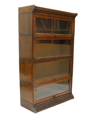 Lot 585 - An oak Globe Wernicke modular bookcase
