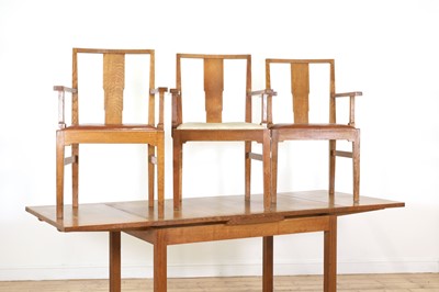 Lot 215 - A Gordon Russell oak dining suite