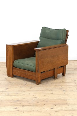 Lot 129 - An Heal's oak library chair