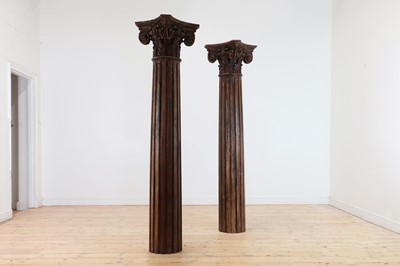 Lot 101 - A pair of carved pine columns