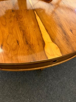 Lot 274 - A yew wood drum table