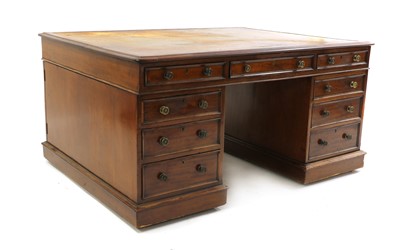 Lot 597 - A mahogany partners desk