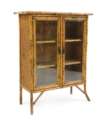 Lot 620 - A Victorian bamboo display cabinet