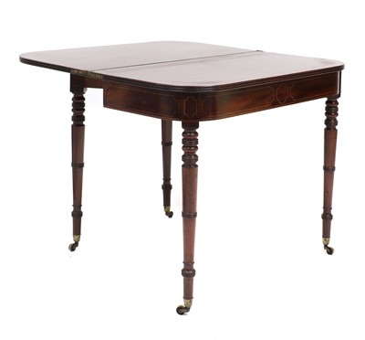 Lot 632 - A George III strung mahogany fold-over tea table