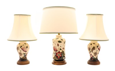 Lot 342 - A group of Moorcroft pottery 'Bramble Revisited' lamps