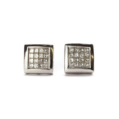 Lot 87 - A pair of white gold diamond earrings