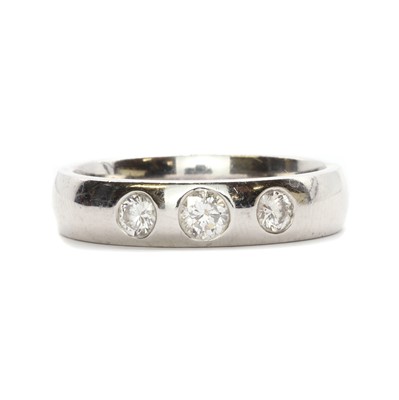 Lot 181 - An 18ct white gold three stone diamond ring