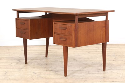 Lot 353 - A Danish teak desk