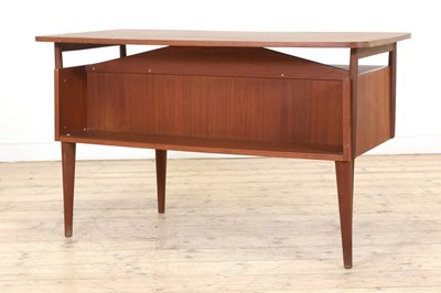 Lot 353 - A Danish teak desk