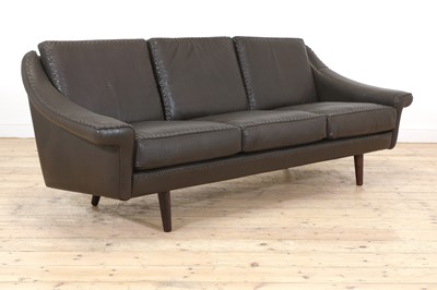 Lot 441 - A Danish brown leather three-seater settee