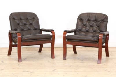 Lot 411 - A pair of Swedish brown leather and bentwood lounge chairs