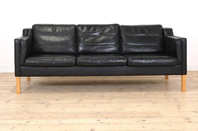 Lot 417 - A Danish black leather three-seater settee