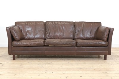 Lot 325 - A Danish brown leather three-seater settee