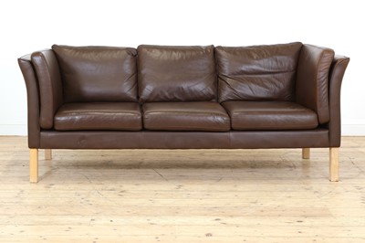 Lot 446 - A Danish brown leather three-seater settee
