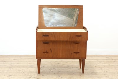 Lot 338 - A Danish teak dressing chest