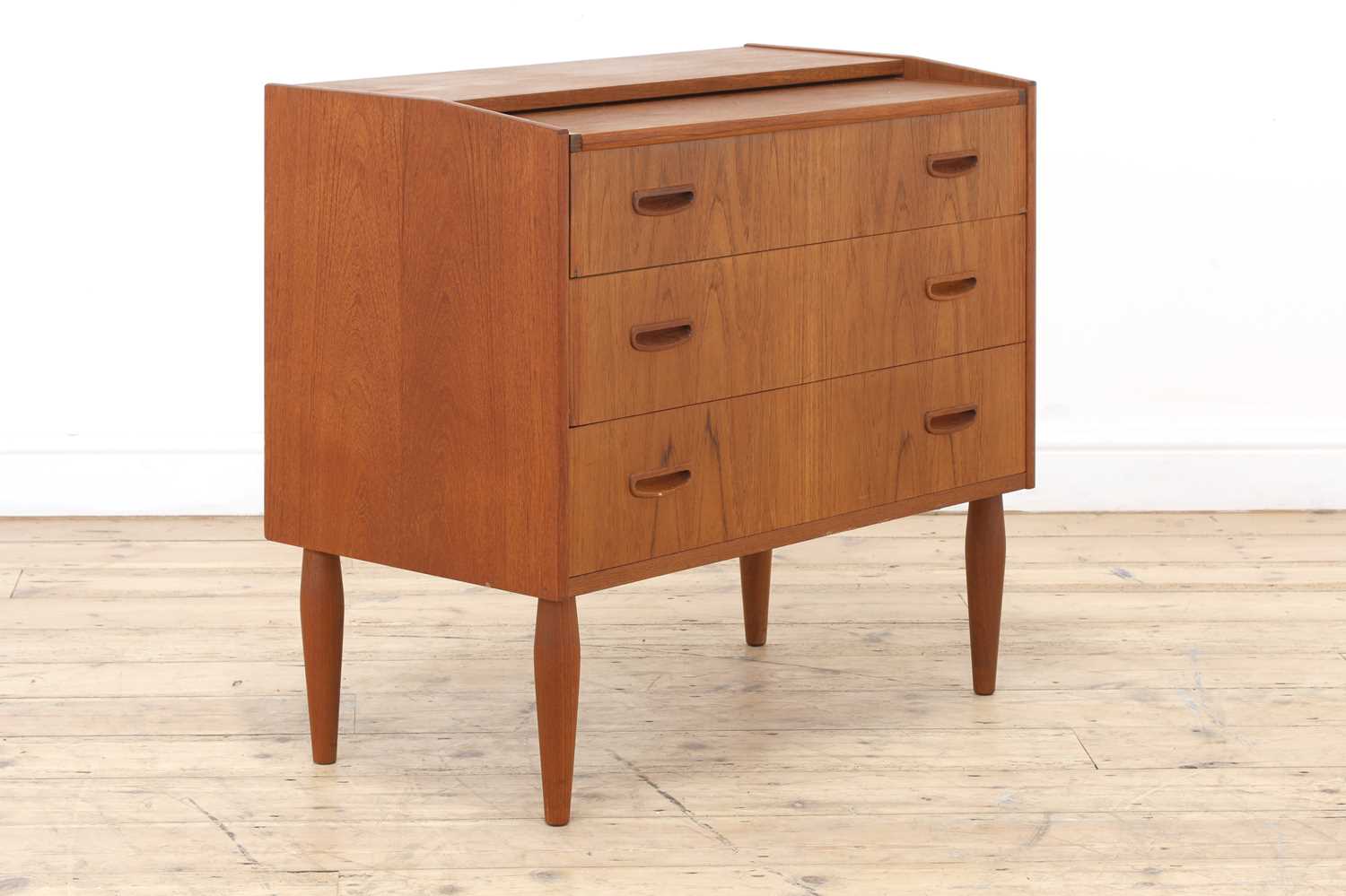 Lot 338 - A Danish teak dressing chest