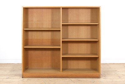 Lot 475 - A light oak open bookcase