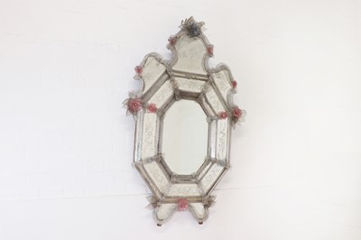 Lot 327 - An etched and moulded glass mirror