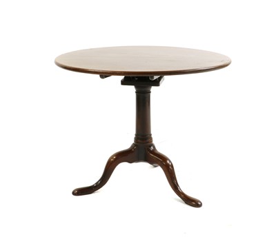Lot 615 - A George III mahogany tripod table