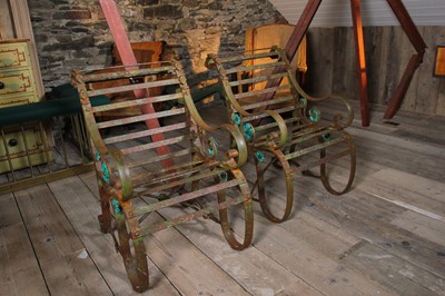 Lot 39 - A pair of iron strapwork garden chairs