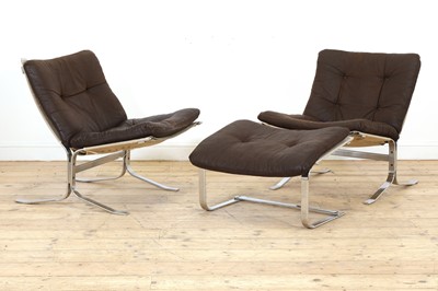 Lot 260 - A pair of Westnofa chrome and leather loungers