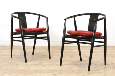 Lot 259 - A pair of Scandinavian ebonised armchairs