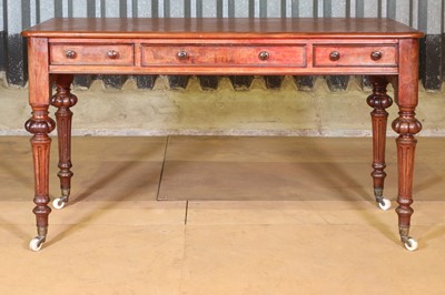 Lot 26 - A Victorian mahogany writing table by Heal & Son